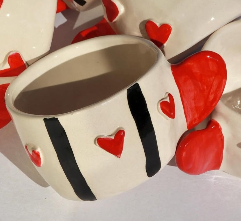 Handcrafted Ceramic Mugs with Heart Designs