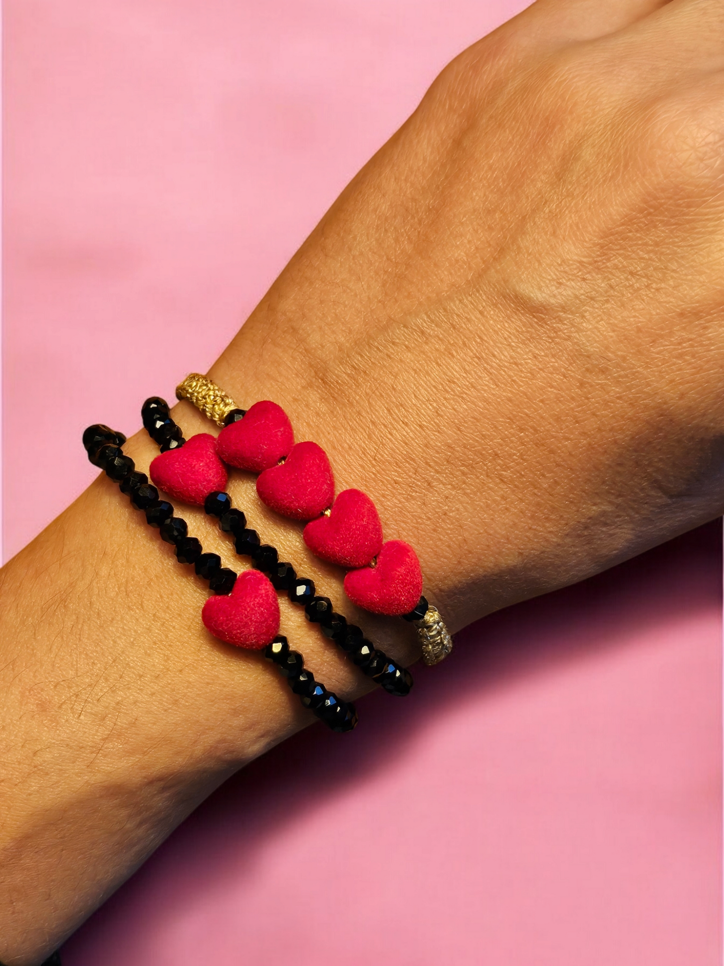 Gold Macrame bracelet adorned with four soft red velvet heart charms