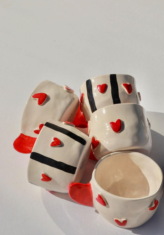 Handcrafted Ceramic Mugs with Heart Designs